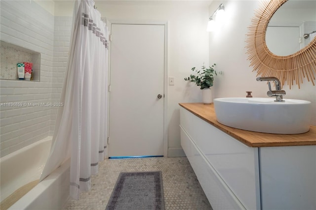 1606 Veracruz Ln, Weston, FL 33327 - bathroom featuring vanity, shower / bath combo with shower curtain, and tile patterned floors