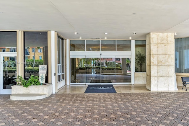 8855 E Collins Ave Unit 2F, Surfside, FL 33154 - common area with recessed lighting and floor to ceiling windows