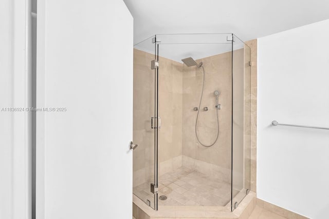 8855 E Collins Ave Unit 2F, Surfside, FL 33154 - full bath with a stall shower and tile patterned floors