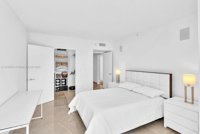 8855 E Collins Ave Unit 2F, Surfside, FL 33154 - bedroom featuring a spacious closet