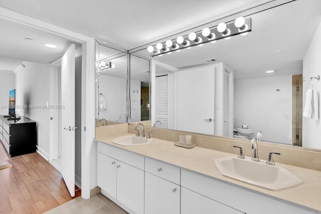 8855 E Collins Ave Unit 2F, Surfside, FL 33154 - bathroom featuring double vanity and a closet