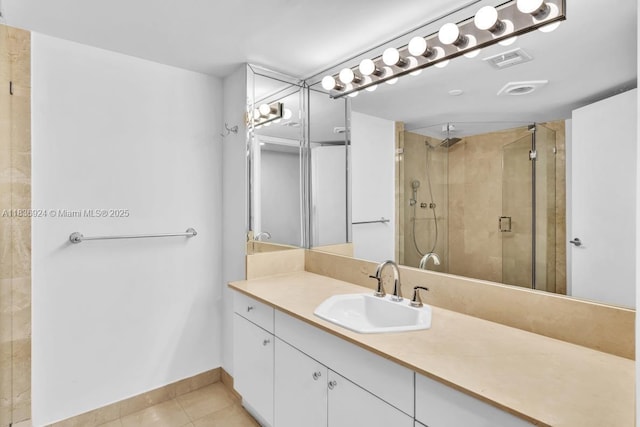 8855 E Collins Ave Unit 2F, Surfside, FL 33154 - full bathroom with a stall shower, vanity, and tile patterned floors
