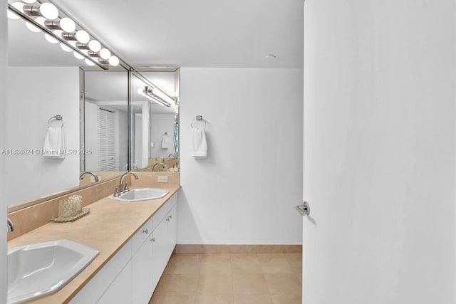 8855 E Collins Ave Unit 2F, Surfside, FL 33154 - full bath featuring double vanity and tile patterned floors