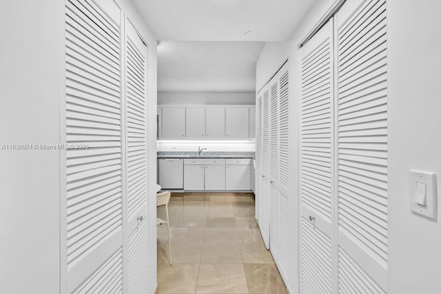 8855 E Collins Ave Unit 2F, Surfside, FL 33154 - hall featuring a sink