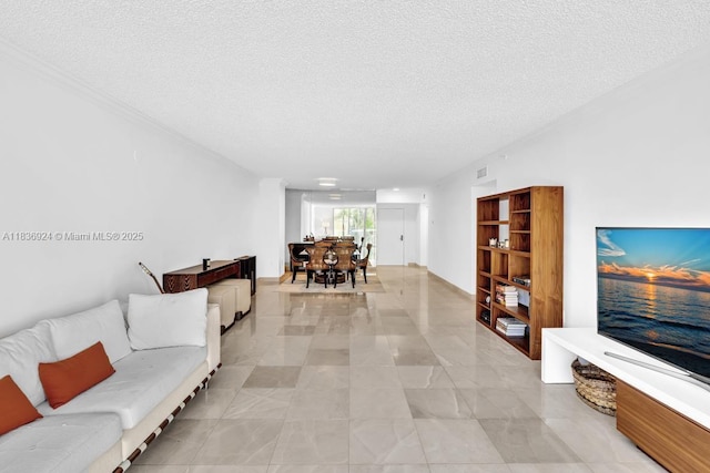 8855 E Collins Ave Unit 2F, Surfside, FL 33154 - living area with a textured ceiling