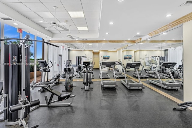 8855 E Collins Ave Unit 2F, Surfside, FL 33154 - exercise room with a ceiling fan and a paneled ceiling