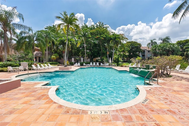 12136 Saint Andrews Pl Unit 204, Miramar, FL 33025 - community pool featuring a patio