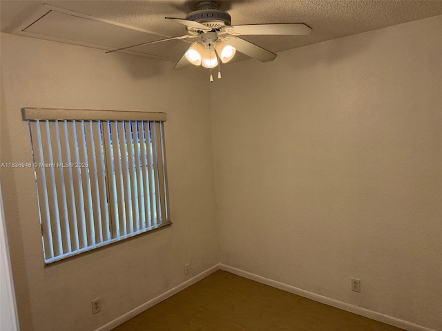 5201 SW 31st Ave Unit 112, Dania Beach, FL 33312 - spare room featuring ceiling fan and a textured ceiling