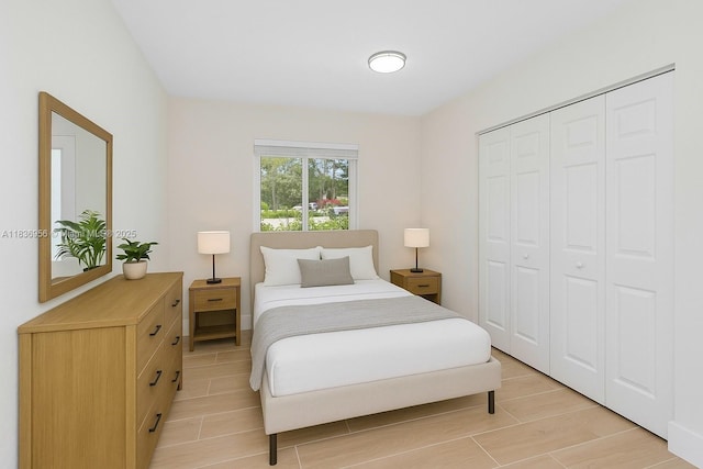 990 NE 159th St, North Miami Beach, FL 33162 - bedroom with a closet and wood tiled floors