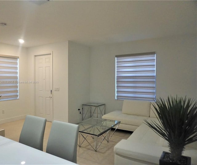 10498 W 33rd Way, Hialeah, FL 33018 - living room featuring baseboards and recessed lighting