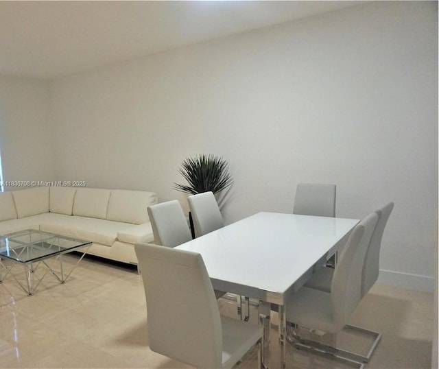10498 W 33rd Way, Hialeah, FL 33018 - dining room with baseboards