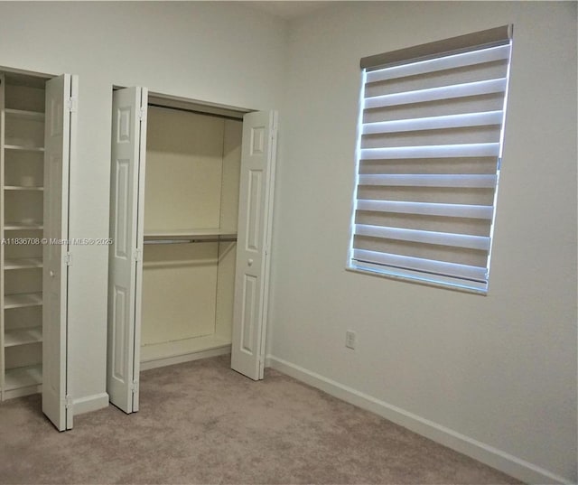 10498 W 33rd Way, Hialeah, FL 33018 - unfurnished bedroom featuring carpet flooring and a closet