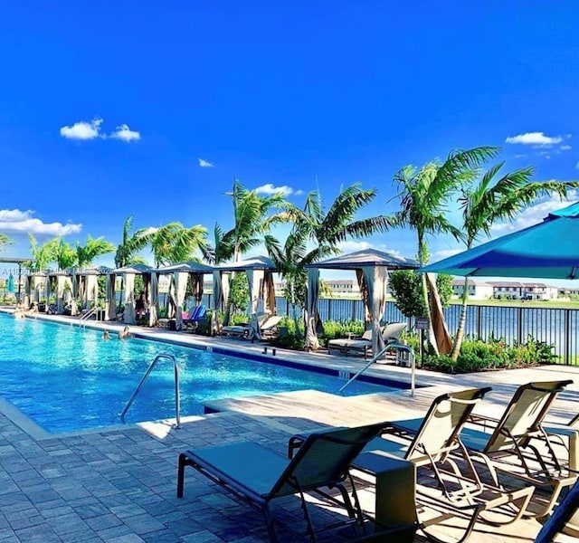 10498 W 33rd Way, Hialeah, FL 33018 - community pool featuring a patio area