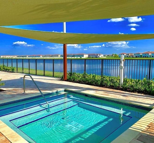 10498 W 33rd Way, Hialeah, FL 33018 - view of pool featuring a swimming pool and a water view