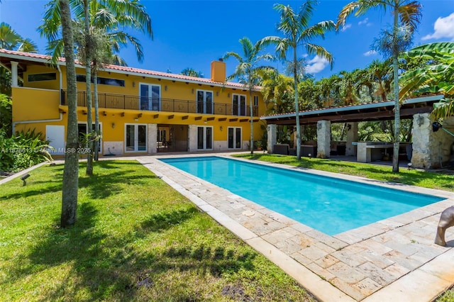 5800 SW 178th Ave, Southwest Ranches, FL 33331 - swimming pool with french doors, a yard, and a patio
