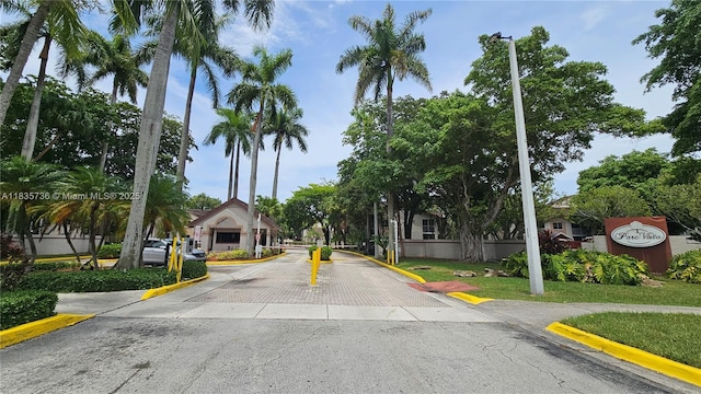 9277 SW 138th Pl Unit 9277, Miami, FL 33186 - view of street featuring curbs and a gated entry