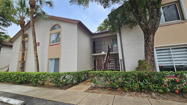 9277 SW 138th Pl Unit 9277, Miami, FL 33186 - view of building exterior with stairway