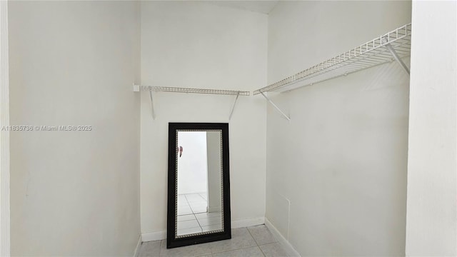 9277 SW 138th Pl Unit 9277, Miami, FL 33186 - walk in closet with light tile patterned flooring