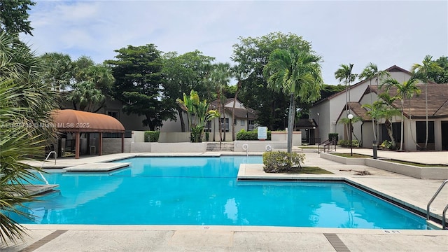 9277 SW 138th Pl Unit 9277, Miami, FL 33186 - community pool with a patio