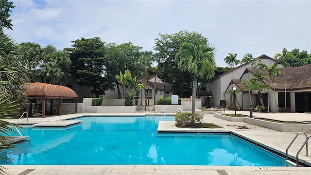 9277 SW 138th Pl Unit 9277, Miami, FL 33186 - community pool featuring a patio