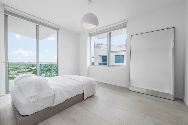 2681 N Flamingo Rd Unit 2708S, Sunrise, FL 33323 - bedroom featuring access to outside and light wood finished floors