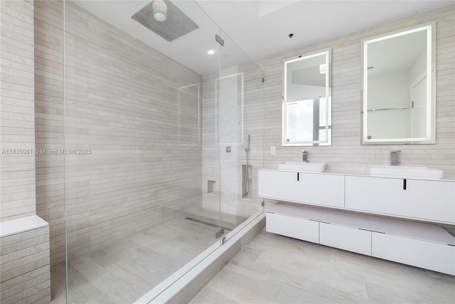 2681 N Flamingo Rd Unit 2708S, Sunrise, FL 33323 - full bathroom featuring double vanity, a stall shower, and recessed lighting