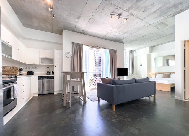 133 NE 2nd Ave Unit 1410, Miami, FL 33132 - living area with finished concrete floors