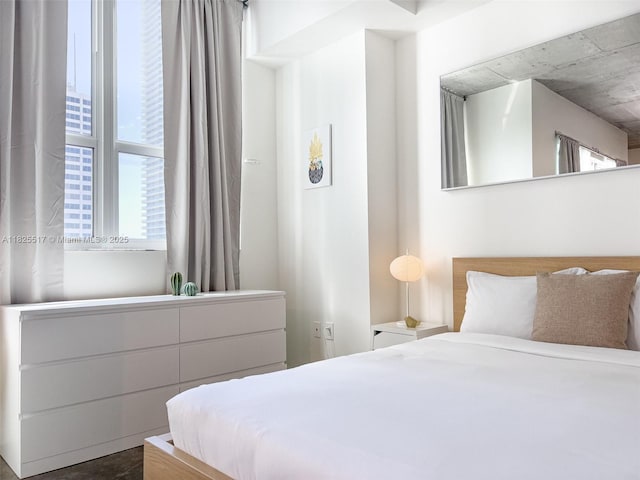 133 NE 2nd Ave Unit 1410, Miami, FL 33132 - bedroom featuring multiple windows