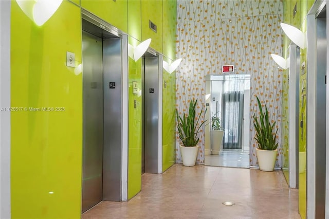 133 NE 2nd Ave Unit 1410, Miami, FL 33132 - hallway featuring elevator and concrete flooring