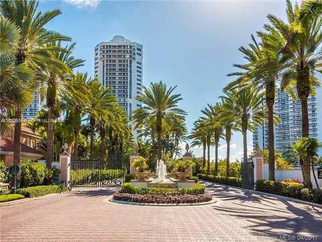 3802 NE 207th St Unit 601, Aventura, FL 33180 - view of home's community with decorative driveway and a gate