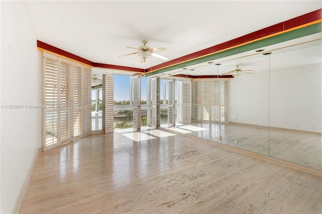 3802 NE 207th St Unit 601, Aventura, FL 33180 - spare room featuring ceiling fan and wood finished floors