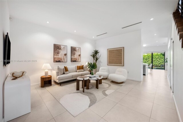 3070 Elizabeth St, Miami, FL 33133 - living area with light tile patterned floors and recessed lighting