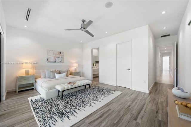 3070 Elizabeth St, Miami, FL 33133 - bedroom featuring wood finished floors, recessed lighting, a closet, and ceiling fan