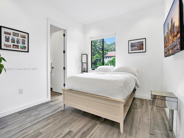 3070 Elizabeth St, Miami, FL 33133 - bedroom featuring wood finished floors and recessed lighting