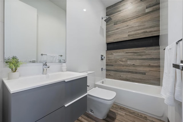 3070 Elizabeth St, Miami, FL 33133 - bathroom featuring wood finished floors, vanity, and shower / tub combination
