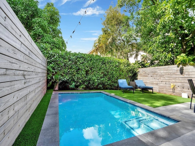 3070 Elizabeth St, Miami, FL 33133 - view of swimming pool featuring a fenced backyard and a patio