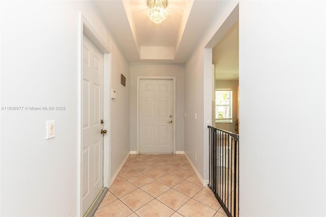 2020 Andromeda Ln, Weston, FL 33327 - hall with a chandelier and light tile patterned floors