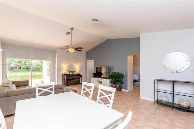 2020 Andromeda Ln, Weston, FL 33327 - dining space with ceiling fan, light tile patterned floors, and lofted ceiling