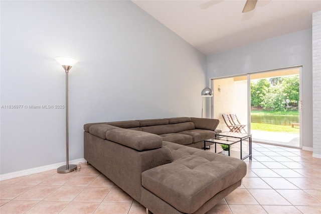 2020 Andromeda Ln, Weston, FL 33327 - living area with light tile patterned floors, ceiling fan, and high vaulted ceiling