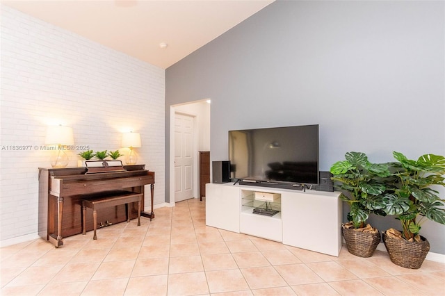 2020 Andromeda Ln, Weston, FL 33327 - living area featuring high vaulted ceiling, light tile patterned floors, and brick wall