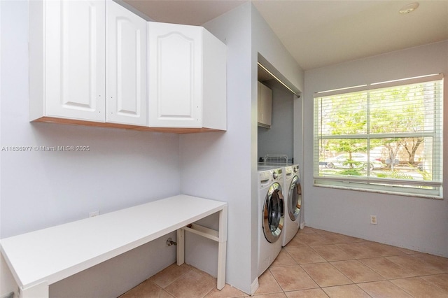 2020 Andromeda Ln, Weston, FL 33327 - laundry room with cabinet space, washer and clothes dryer, and light tile patterned floors