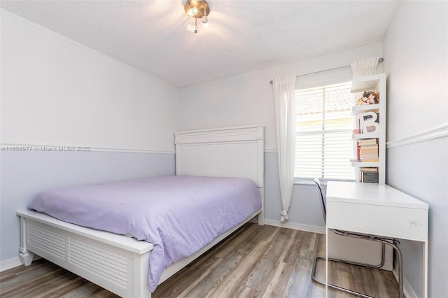 2020 Andromeda Ln, Weston, FL 33327 - bedroom featuring wood finished floors and baseboards