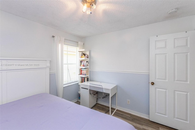 2020 Andromeda Ln, Weston, FL 33327 - bedroom with wood finished floors and a textured ceiling