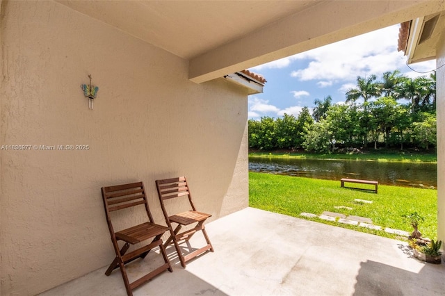 2020 Andromeda Ln, Weston, FL 33327 - view of patio with a water view