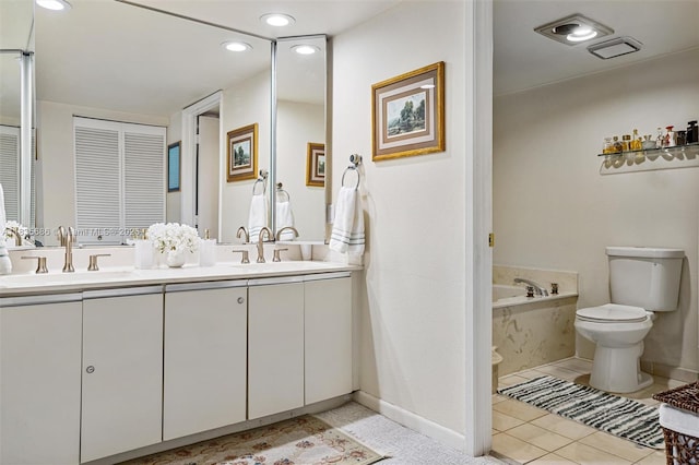520 Brickell Key Dr Unit A1404, Miami, FL 33131 - full bathroom with double vanity, a garden tub, recessed lighting, a closet, and tile patterned floors