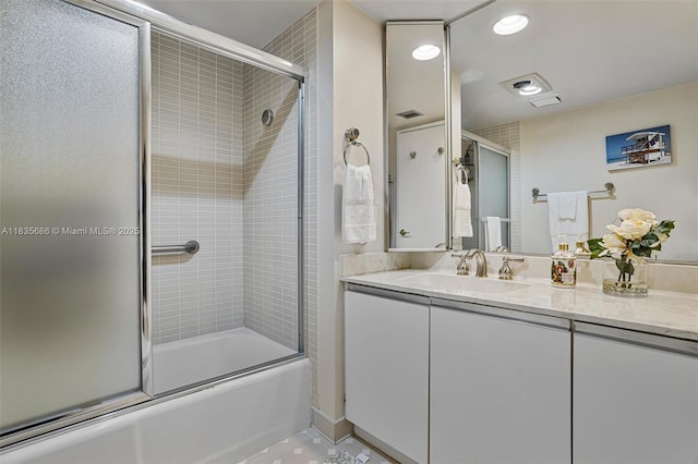 520 Brickell Key Dr Unit A1404, Miami, FL 33131 - bathroom featuring shower / bath combination with glass door, vanity, and recessed lighting