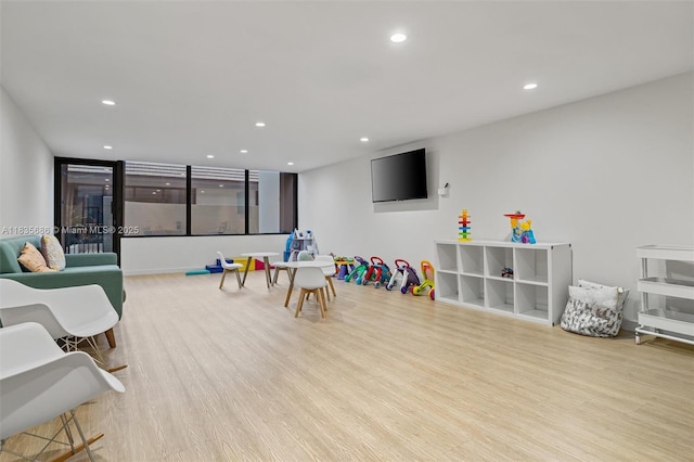 520 Brickell Key Dr Unit A1404, Miami, FL 33131 - recreation room featuring recessed lighting and wood finished floors