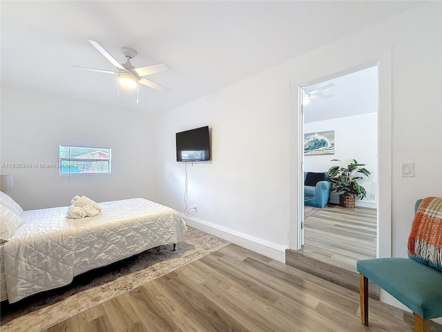 1309 SW 75th Ave, North Lauderdale, FL 33068 - bedroom featuring wood finished floors and ceiling fan