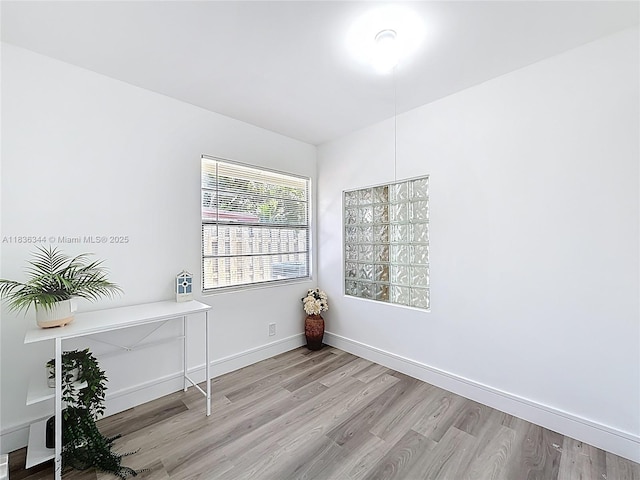 1309 SW 75th Ave, North Lauderdale, FL 33068 - unfurnished office with wood finished floors and baseboards