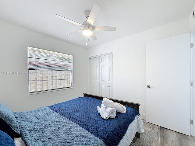 1309 SW 75th Ave, North Lauderdale, FL 33068 - bedroom with light wood-type flooring, a closet, and ceiling fan